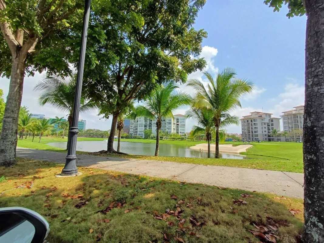 Exterior view of The Colonial towers surrounded by golf greens and tropical landscaping in Santa Maria Panama