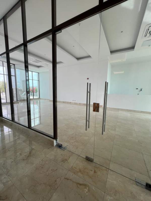 Office or study area with glass partitions and marble floors in The Colonial Santa Maria Panama
