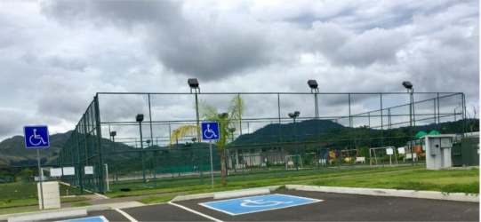 Bedroom with closet, roller blinds, and garden views in River Valley apartment Panama Pacifico