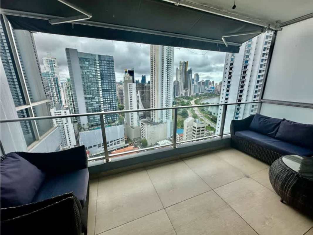 Bright living dining area with floor-to-ceiling windows and ocean views in PH BICSA Avenida Balboa Panama