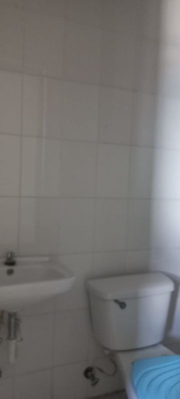 Kitchen with wood cabinets, countertop space, and stove in PH Lexitong Tower Panama