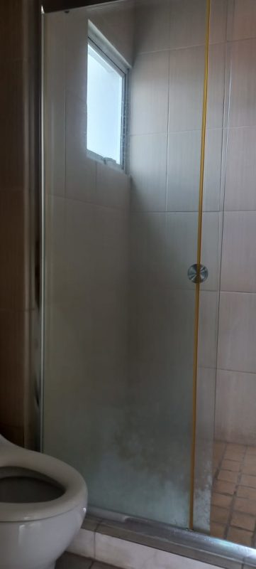 Bedroom with built-in closets and large window with city view in PH Lexitong Tower Panama