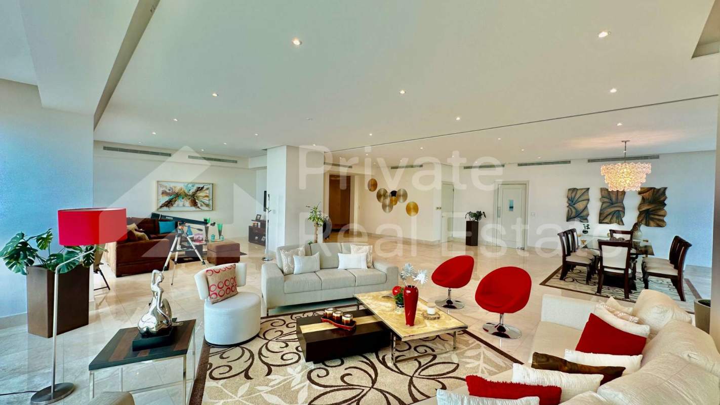 Elegant primary bathroom with double vanity, marble walls, glass shower PH Vitri Costa del Este Panama