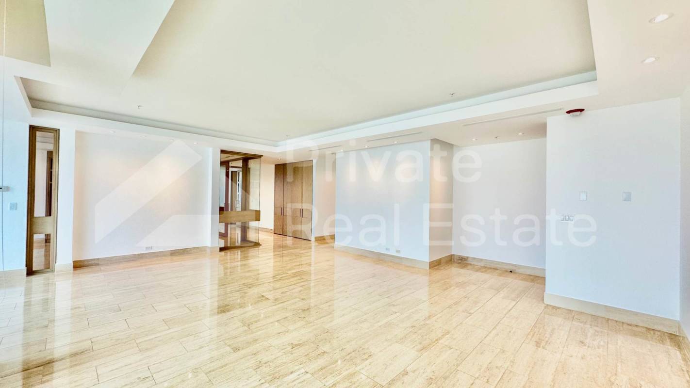 Bright living area with city view and floor-to-ceiling windows at PH Aria Costa del Este