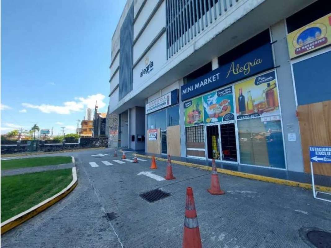 Simple tiled bathroom with sink and toilet in commercial unit PH Alegria Panama