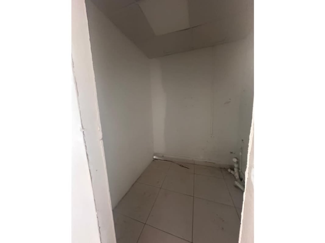 Small utility room with tile floor and unfinished plumbing in PH Alegria Panama City