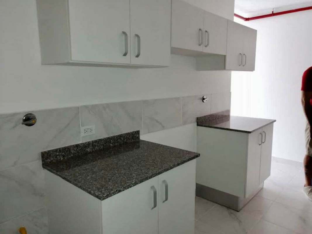 Contemporary bathroom with walk-in shower, marble-style tiles, vanity at PH Mystic Gates Panama