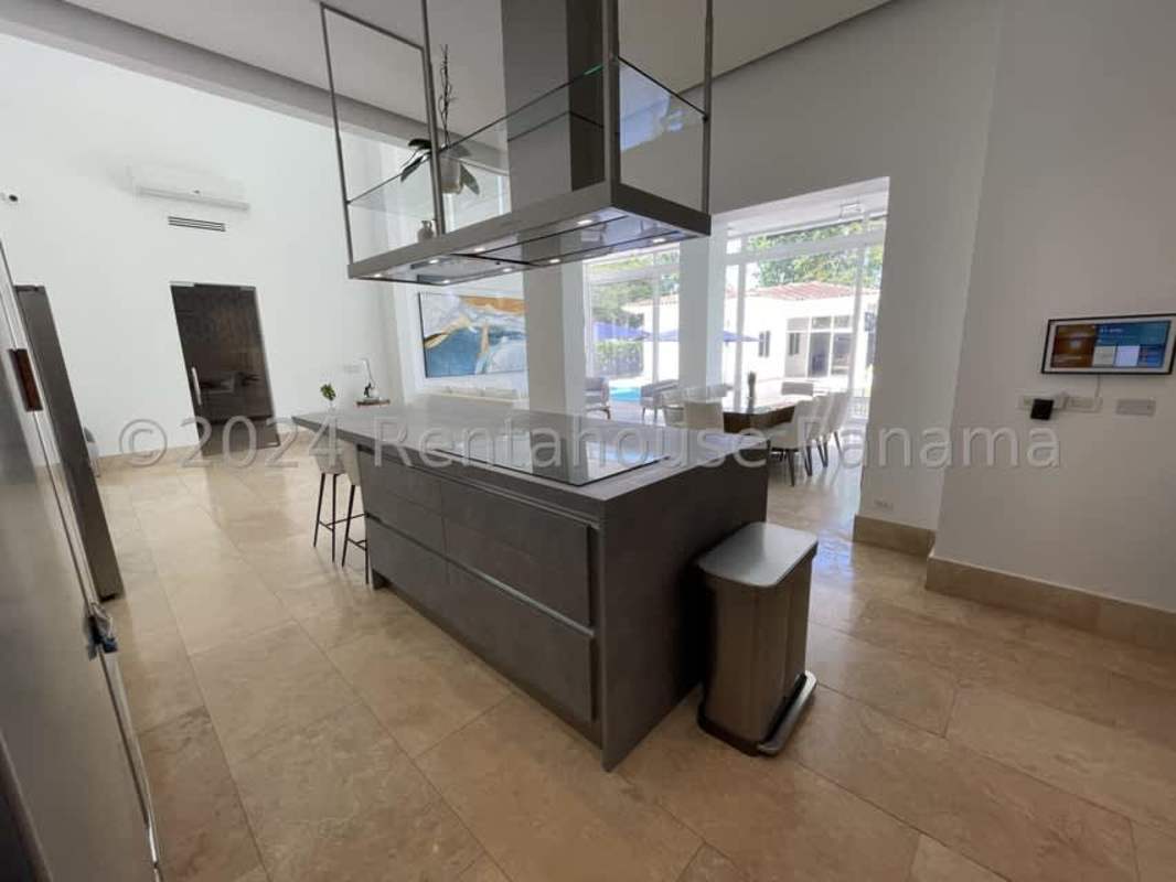 Private pool area with sun loungers and covered patio in luxury Santa Maria villa Panama