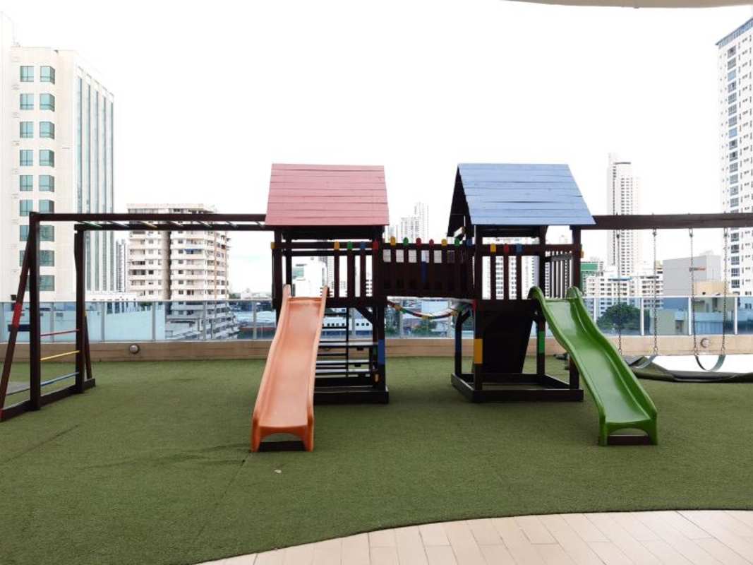Rooftop children playground with city skyline view at PH Joy Tower Panama