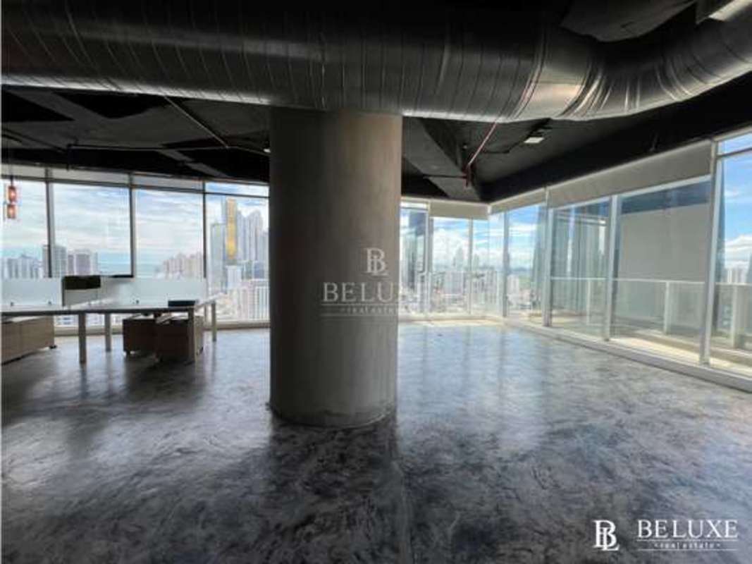 Modern industrial office interior with panoramic city skyline views in F&F Tower Panama