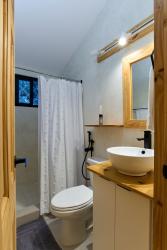 Tropical swimming pool surrounded by lush gardens in luxury golf villa Coronado Panama