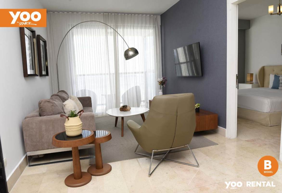 Open kitchen with island and dining area luxury apartment PH YOO Panama City