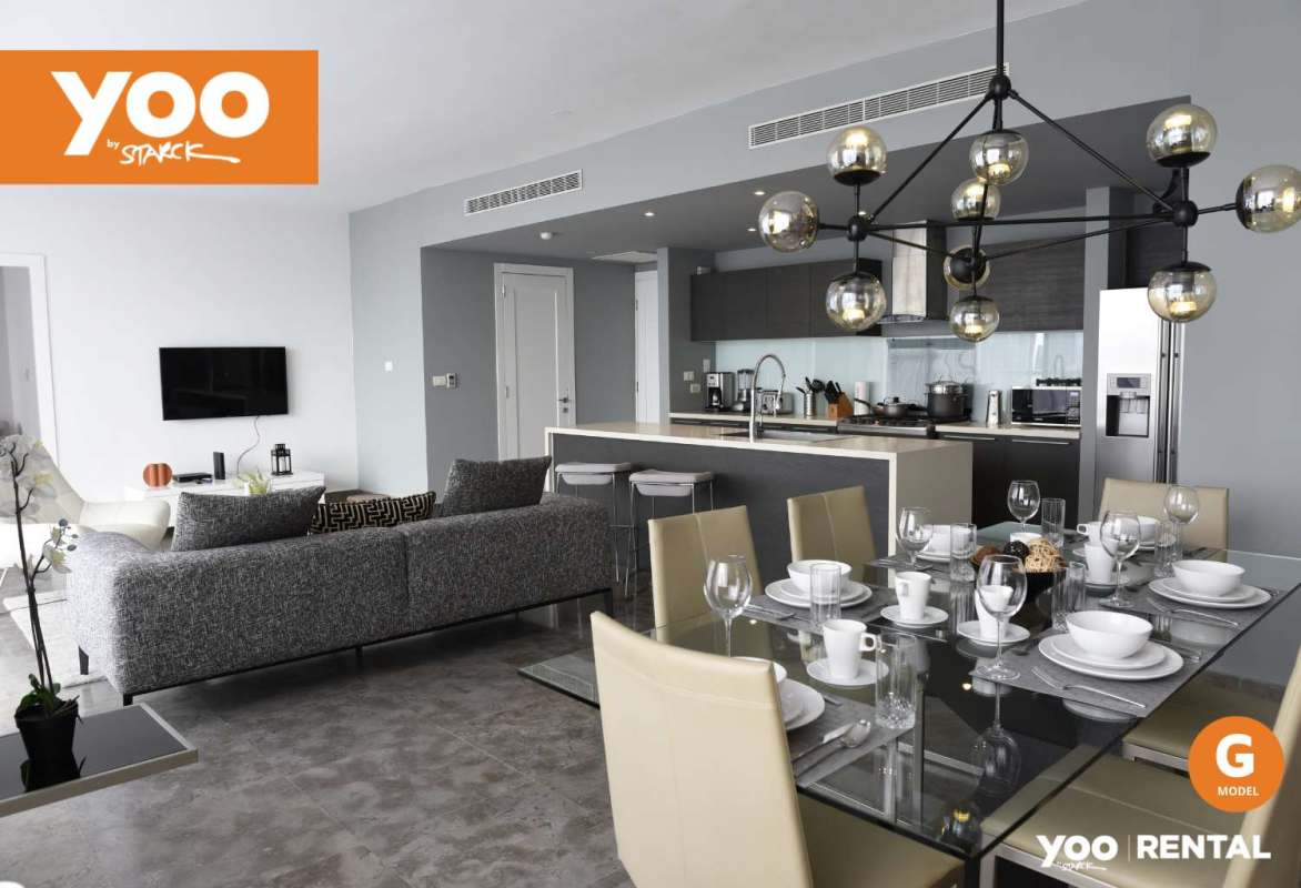 Spacious master bedroom floor-to-ceiling window city ocean view in Yoo Panama apartment