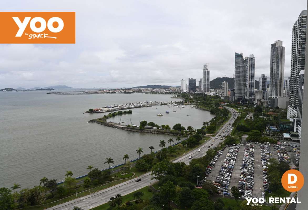 Large bedroom with floor to ceiling windows and panoramic oceanview at PH YOO Panama