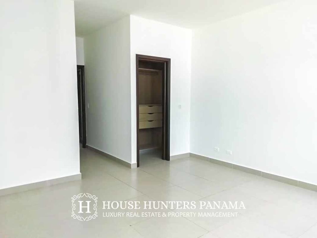 Modern bathroom with double sink vanity and glass enclosed shower in PH Aventura Punta Paitilla Panama