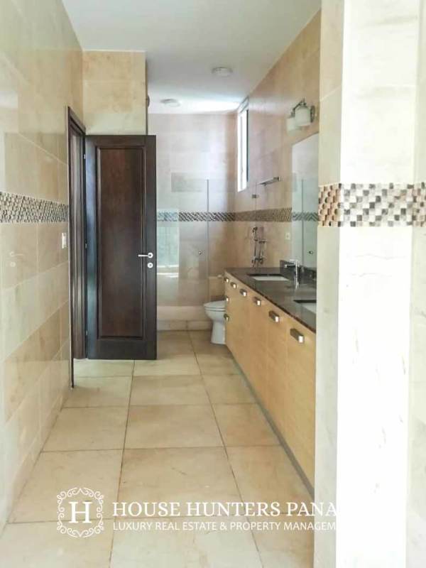 Contemporary bathroom with glass shower modern vanity PH Aventura Punta Paitilla luxury apartment