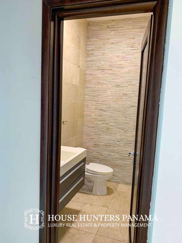 Bedroom with large window and city view in PH Pacific Point Punta Paitilla Panama