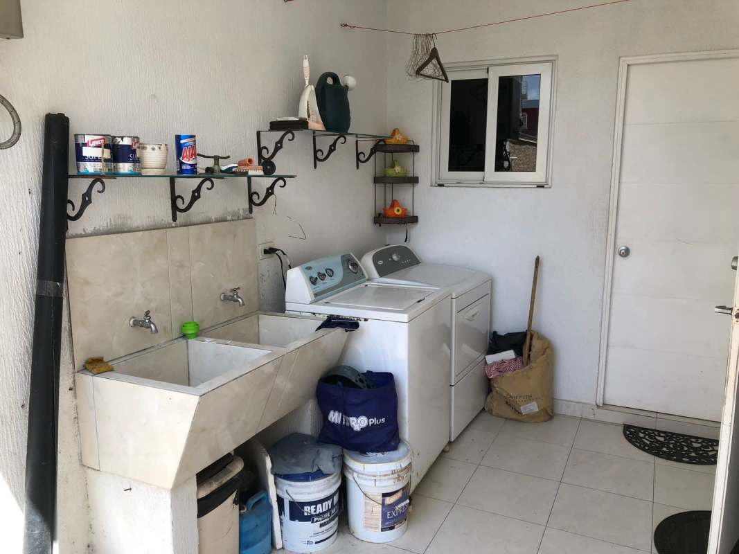 Large living and dining room with access to terrace in Costa Sur house Panama