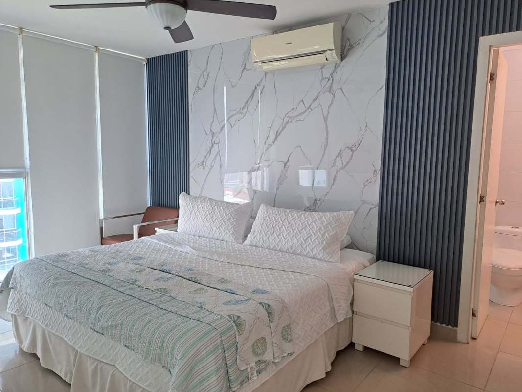 Bright living room with large balcony overlooking ocean, furnished apartment PH Belle View Panama City