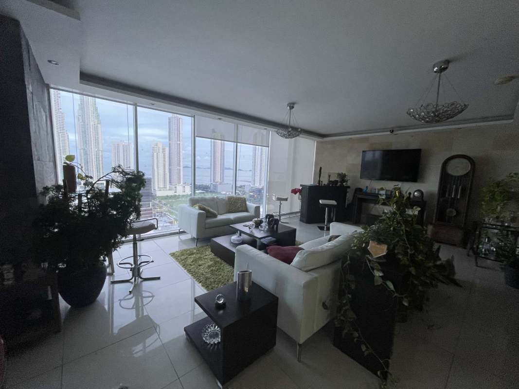 Modern living and dining with panoramic city ocean view large windows PH Latitude Costa del Este Panama