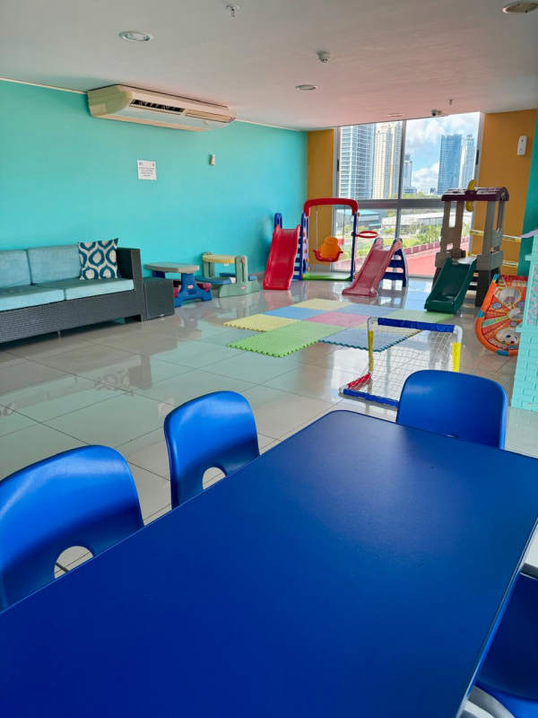 Indoor children's play area with city view PH Latitude Costa del Este Panama