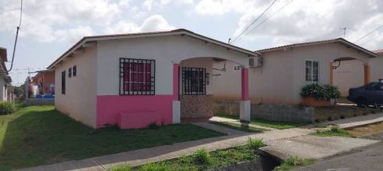 Small porch and front garden of affordable single family house for rent La Chorrera Panama