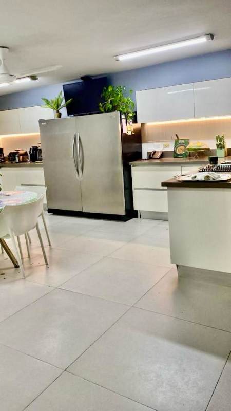 Contemporary kitchen fully equipped with modern appliances in La Alameda Betania Panama