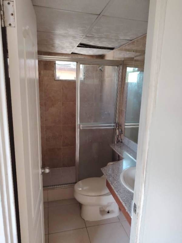 Bathroom with glass enclosed shower and granite sink Mallorca Village Los Andes Panama