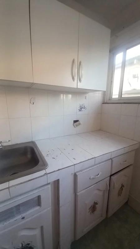 Empty bedroom with tile floors and large window PH Santa Elena Parque Lefevre Panama
