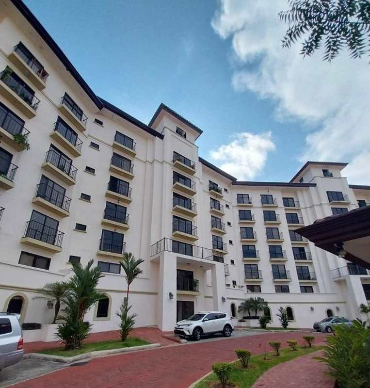 Bright bedroom with tile floor and window at Embassy Village Clayton Panama