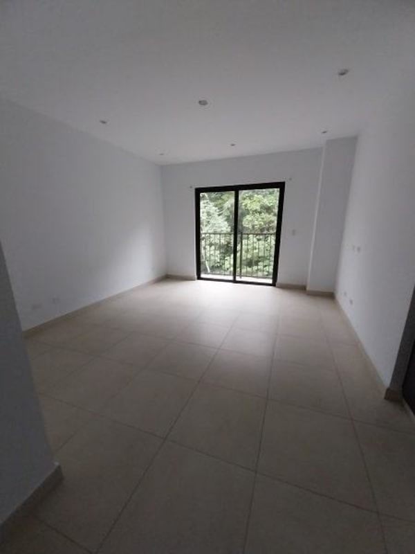 Kitchen with granite countertops, tile floor, dark cabinets at PH Embassy Village Clayton