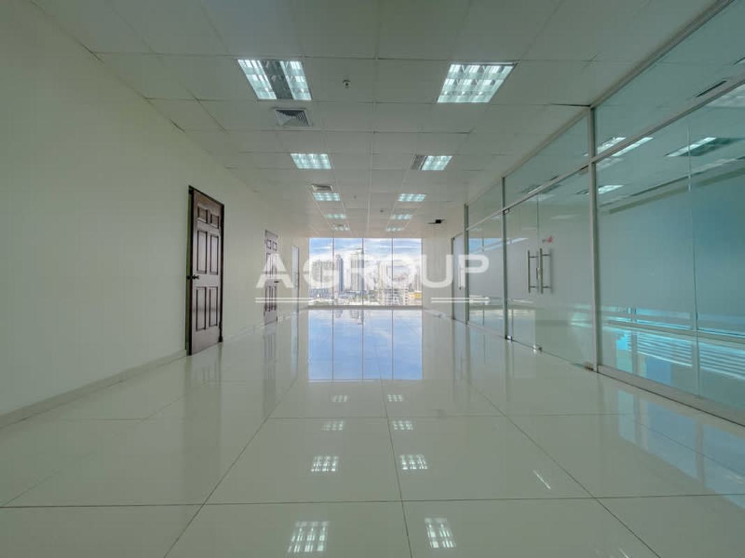 Private enclosed office with glass walls and large windows at PH Office One Obarrio Panama