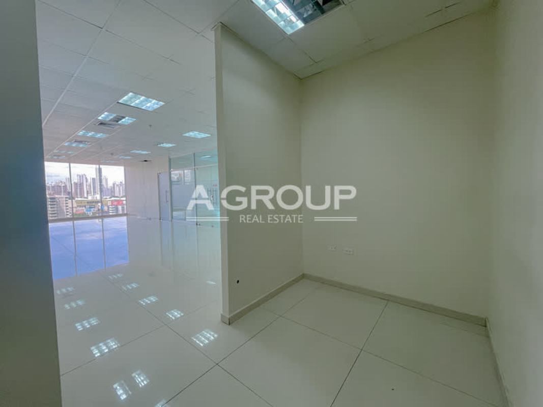 Private office area with large city view windows and glass doors PH Office One Obarrio Panama