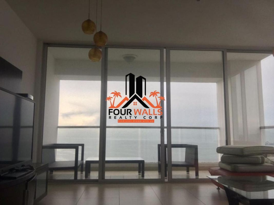 Kitchen with black granite countertops and stainless appliances in PH Rivage Panama City