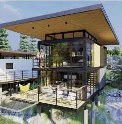 Cantilevered hillside home design with balcony for eco development near El Valle