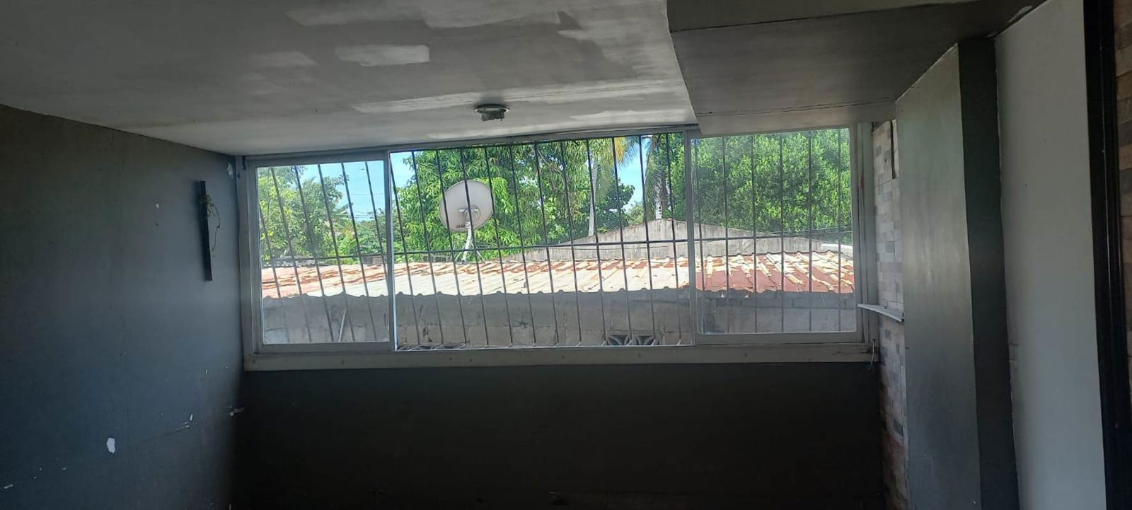 Unfinished living room area natural light bank owned apartment PH Vitto Pedregal Panama