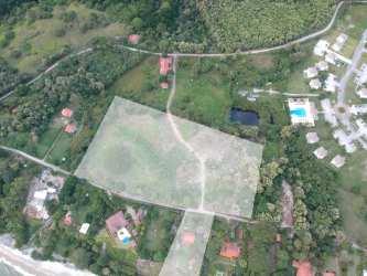 Vacant beachfront property with ocean waves and palm vegetation at Playa Solymar Bijao Panama