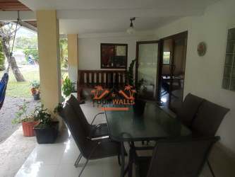 Traditional style kitchen and dining with wooden furniture in El Valle de Antón estate for sale Panama