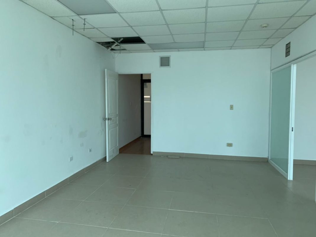 Unfurnished office with tiled flooring and drop ceiling inside Century Tower Panama