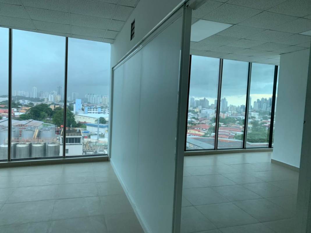 Bright empty office with floor to ceiling windows panoramic views The Century Tower in Panama