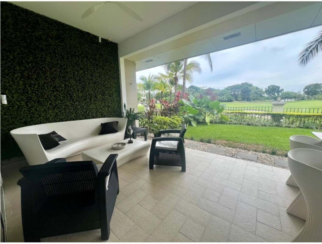 Luxury living room with large terrace access at The Reserve Santa María furnished apartment Panama
