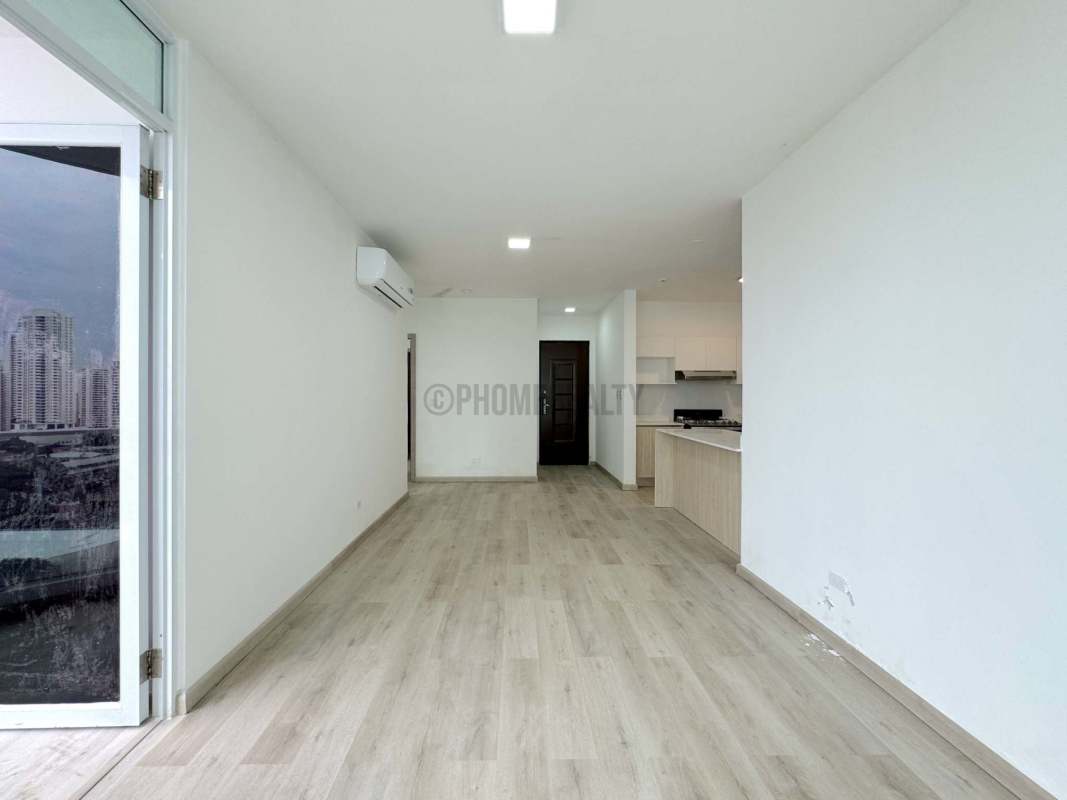 Kitchen area with cabinetry and laundry space in PH Acuarela San Francisco Panama