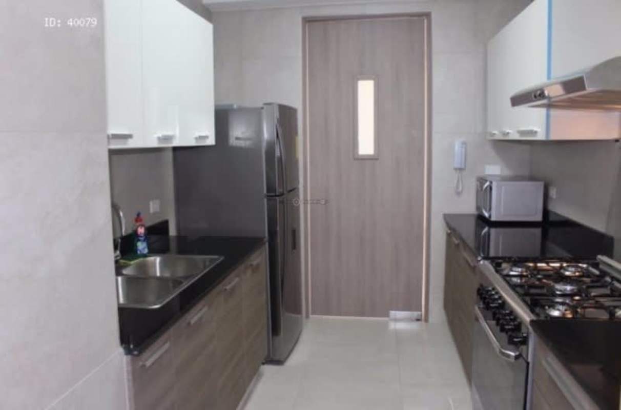 Apartment kitchen with granite countertops and stainless appliances PH Luxor 300 Panama