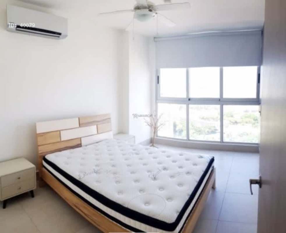 Minimalist bedroom with large window built-in closet PH Luxor 300 apartment Panama