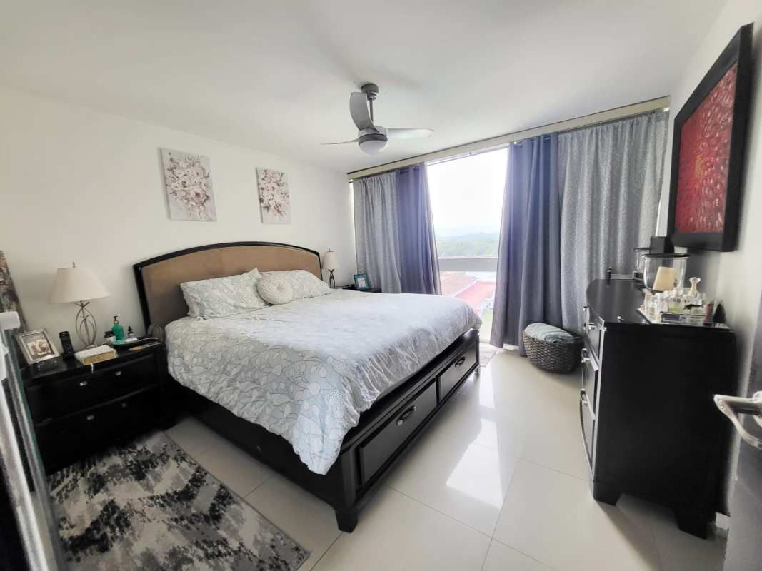 Modern master bedroom with large window natural light closet PH Pine Hill Albrook Panama