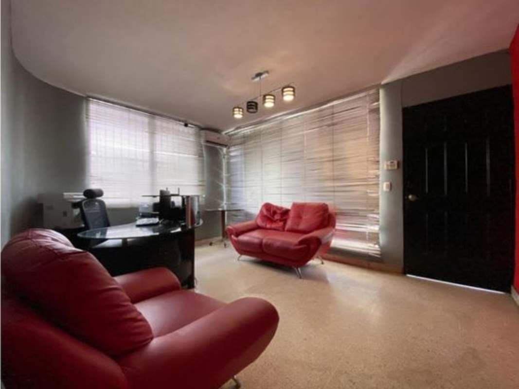 Covered terrace or balcony with railing in commercial house San Francisco Panama