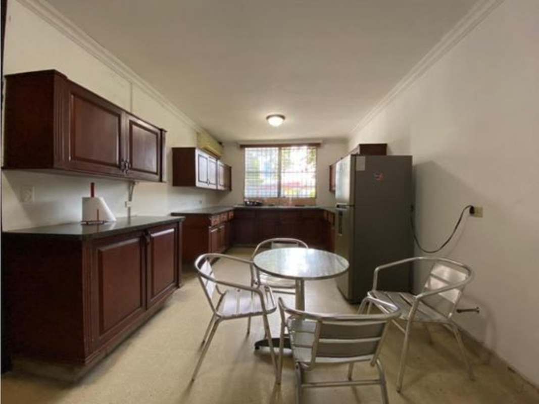 Office room with blue painted walls natural light San Francisco Panama City