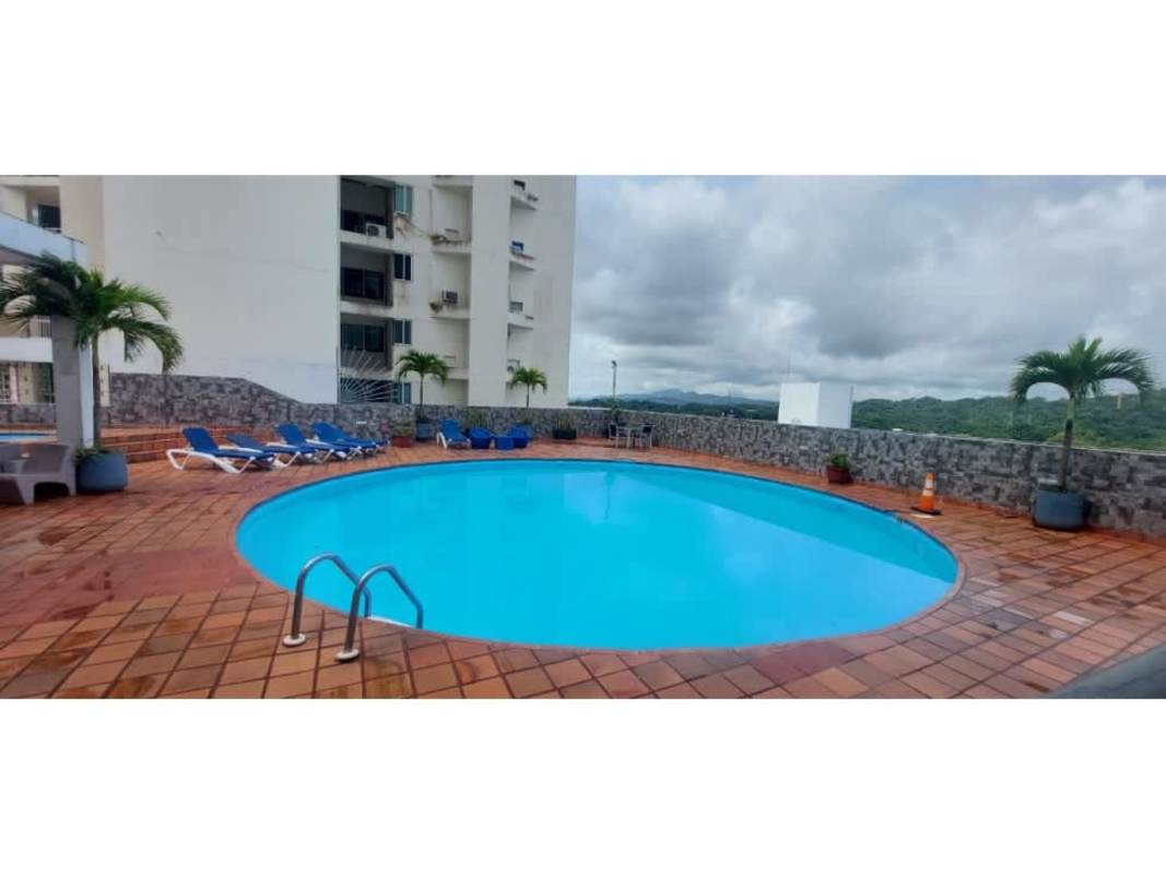 Pool area with sun deck, lounge chairs, and views at PH El Mare 4000 Panama