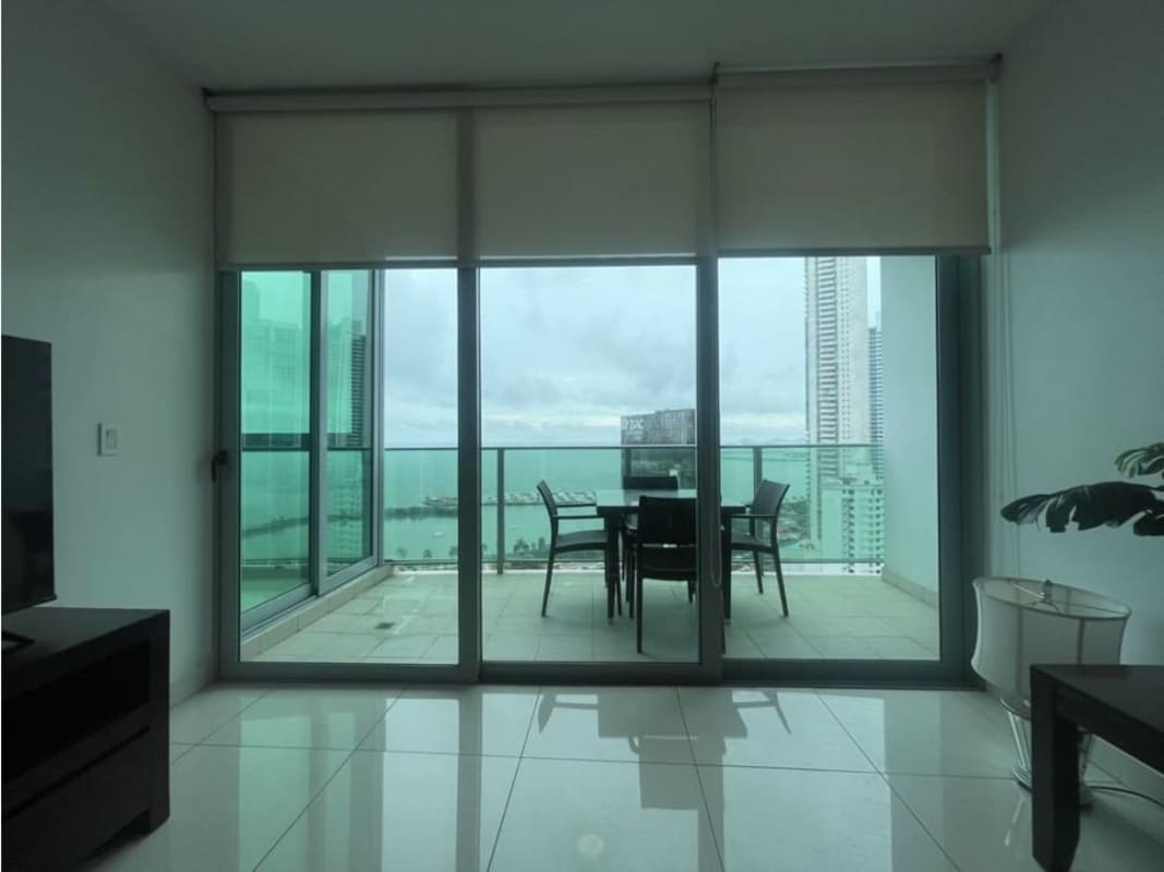 Modern kitchen with stainless steel appliances and granite countertops in PH Allure at the Park Panama