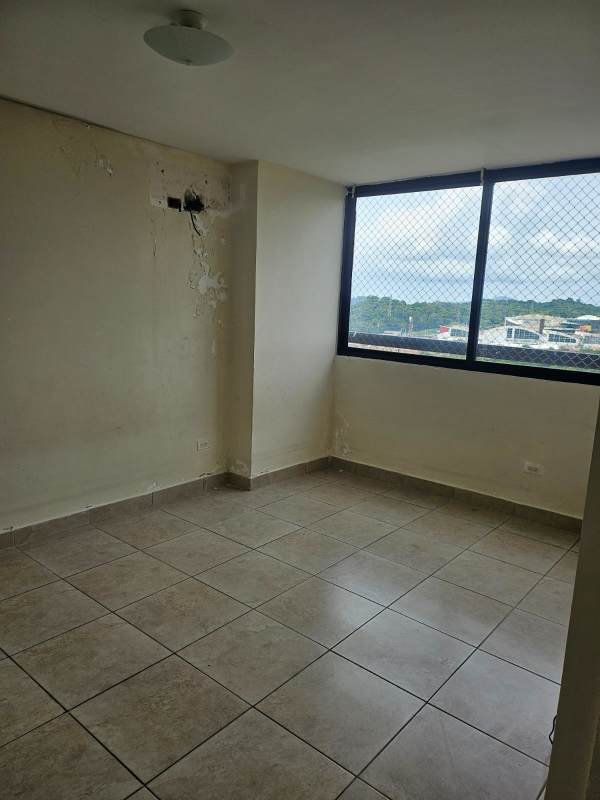 Bedroom with ceramic tiled floors and large window with safety mesh Condado Country Club Panama